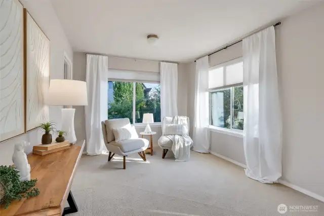 A sweet sitting area to sit and relax, enjoy.