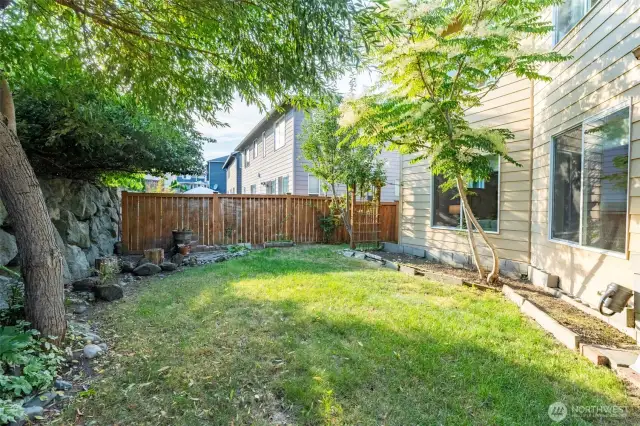 Fully fenced yard will keep pets and little ones safe at play.