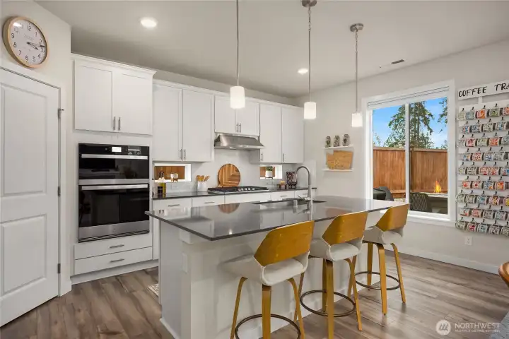 Century homes have luxury amenities that the newer developments don't. Full casing around the windows and baseboards, stainless steel appliances, gleaming quartx counters and real wood cabinet doors. Full tile backspash and a walk in pantry.