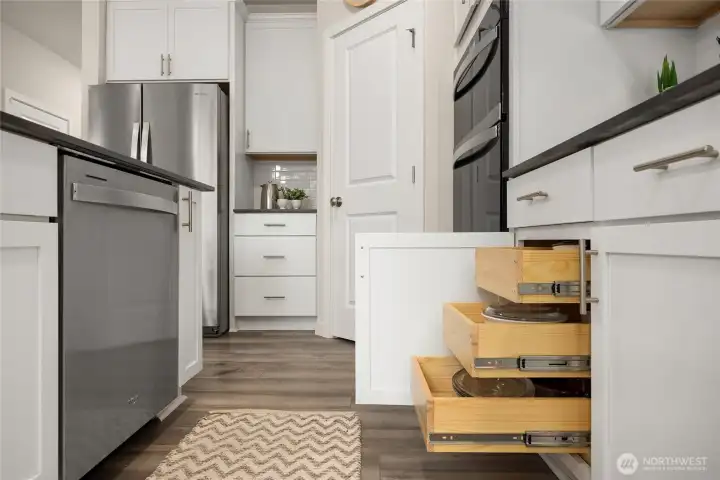 Owner installed these kitchen roll outs to make storage more efficient.