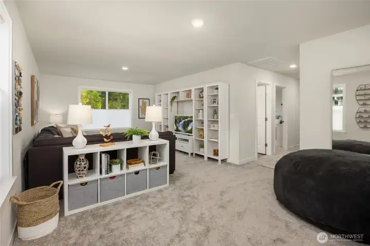 Up the stairs is this beautiful bonus/family room.