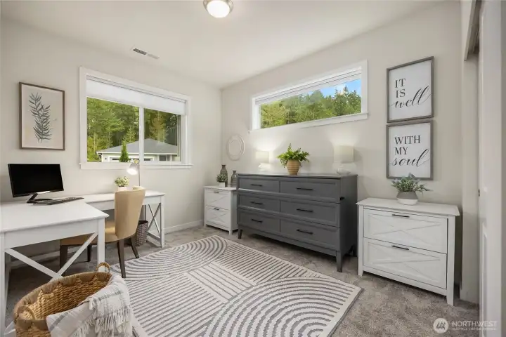 This is the main floor bedroom currently being used as a combo office and guest space. (that dresser opens up to a fold out bed). Owner is open to selling furnishings.