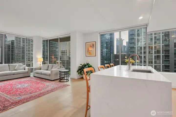 Another view of the Living room from the kitchen. Island is a great spot for breakfast!