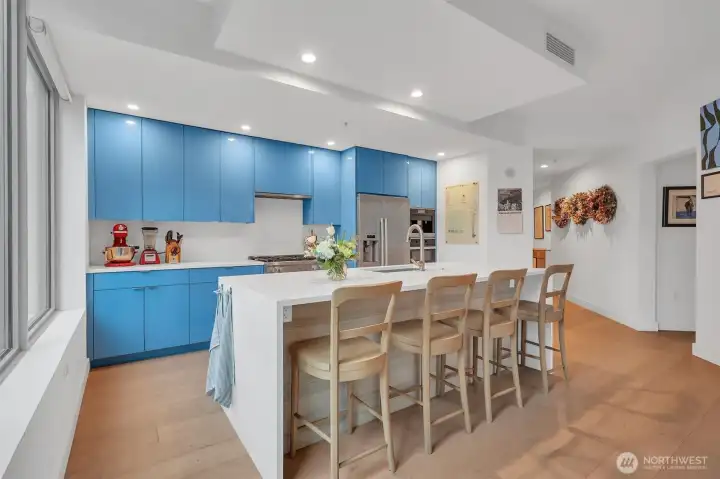Looking into the kitchen from the living room. You'll love the modern cabinets that were updated by previous owner.
