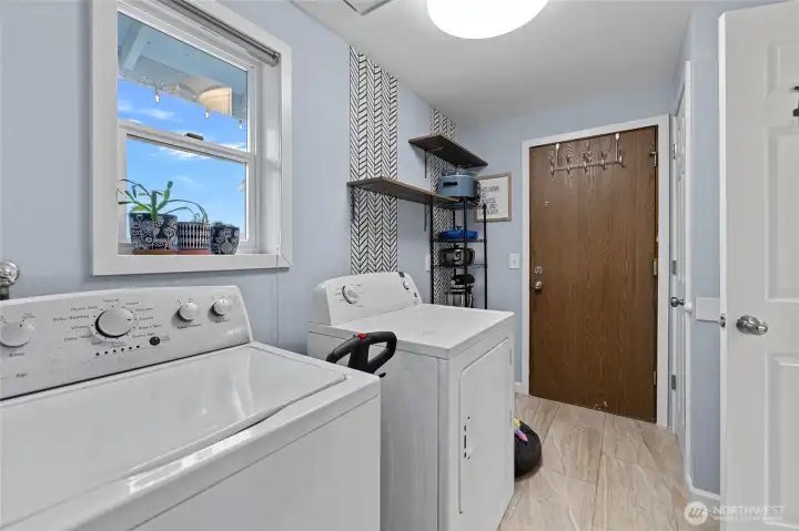 Laundry room off the kitchen and garage