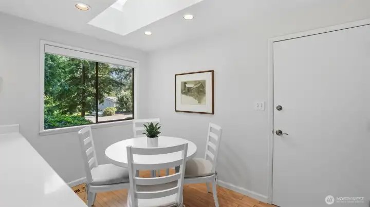 Start your mornings with breakfast bathed in natural light and serene views of the trees.