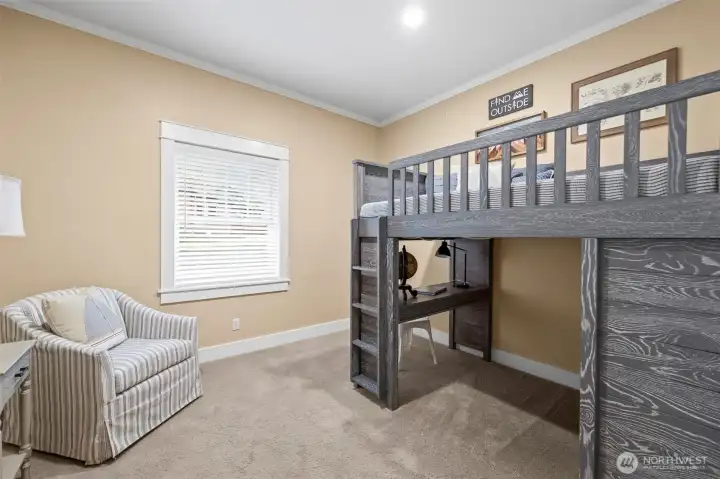 Main floor bedroom keeps your little ones close to the master, but far enough for privacy, or functions great as a second office.
