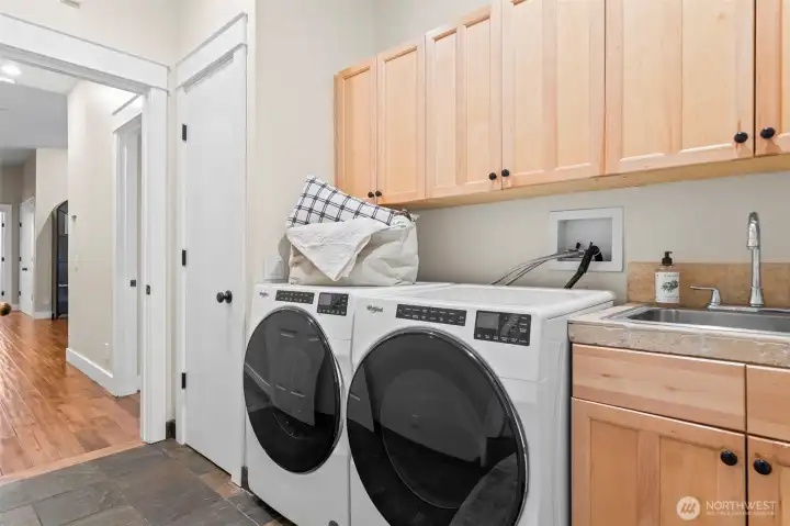 Laundry/mud room provides the perfect transition from the garage to the living space.