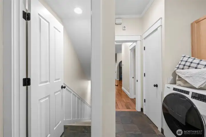 Basement access is through the laundry/mud room off the garage, allowing for isolation between living spaces for multi-generational living with shared use of this space.