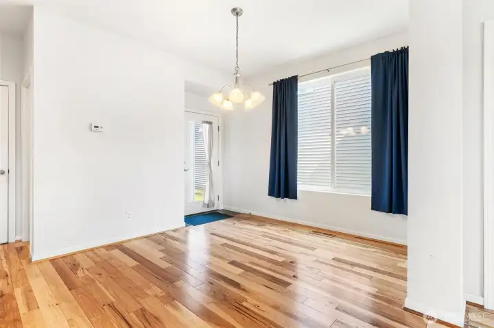 Dining room with access to side yard/alley Dining room with access to side yard/alley
