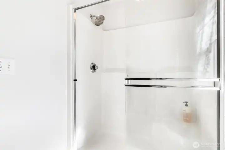 Shower in primary suite bathroom