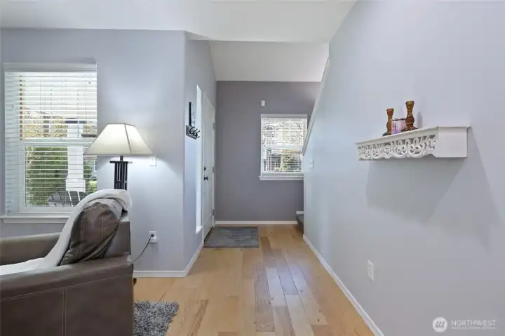 Vaulted entry to home immediately shows the crisp and bright feel.