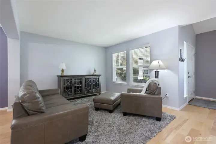 The front windows bring in light and the fresh color palette invokes a peaceful feeling.