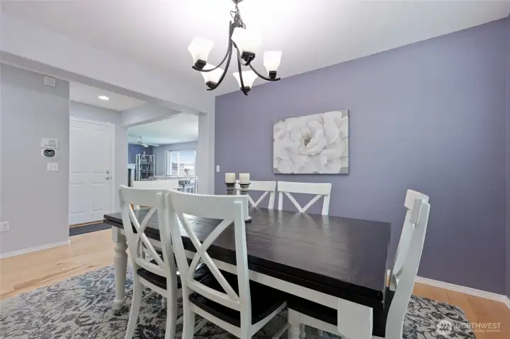 Open dining room is a lovely place to enjoy serving guests and convenient enough for less formal everyday meals.