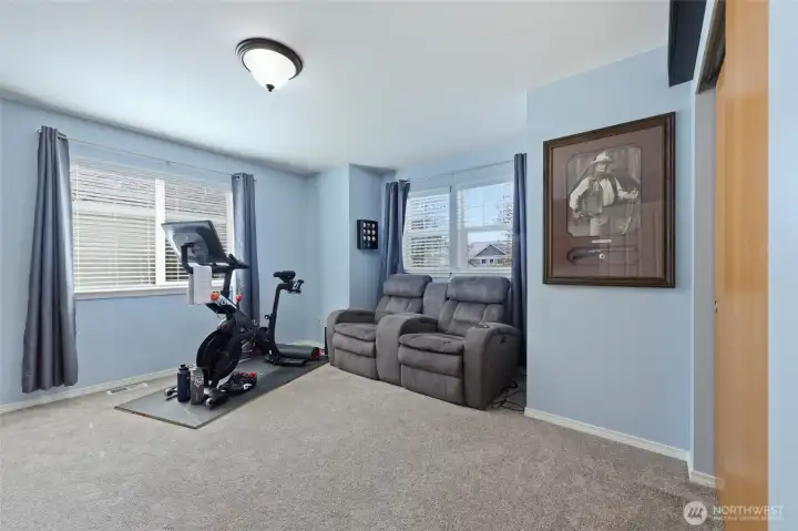 Second bedroom used as bonus/workout space; Bay window offers attractive element and could be used for window seat if desired.