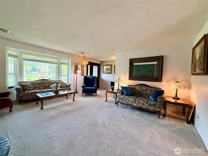 The entrance is off of the living room.