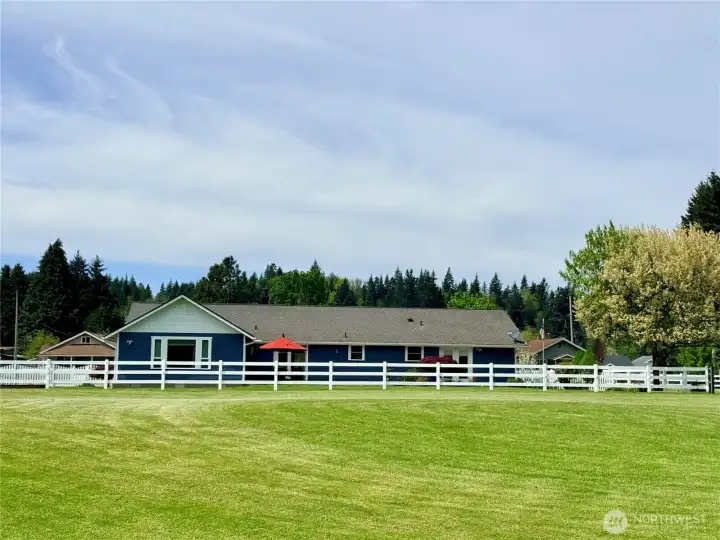 Back of the home from the pasture.