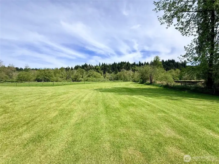 Level pasture overlooking the river.