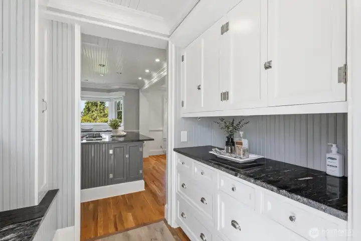 Use this space as a coffee or wine bar, or a handy appliance garage for all your kitchen gadgets.