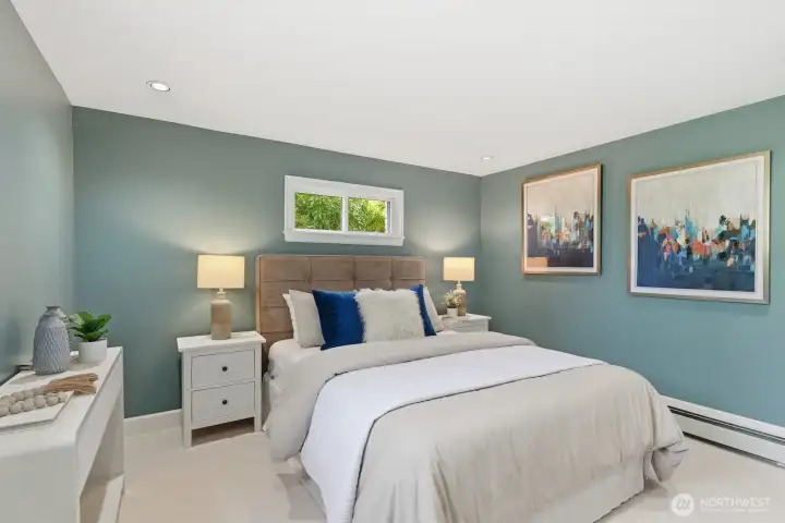 Head downstairs to discover even more space, including this spacious third bedroom.