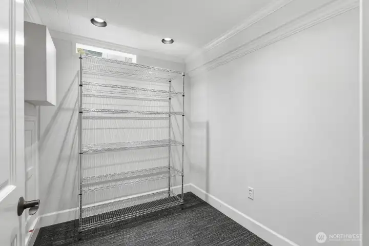 One of two awesome storage rooms downstairs - great for all your pantry staples and Costco-sized purchases.