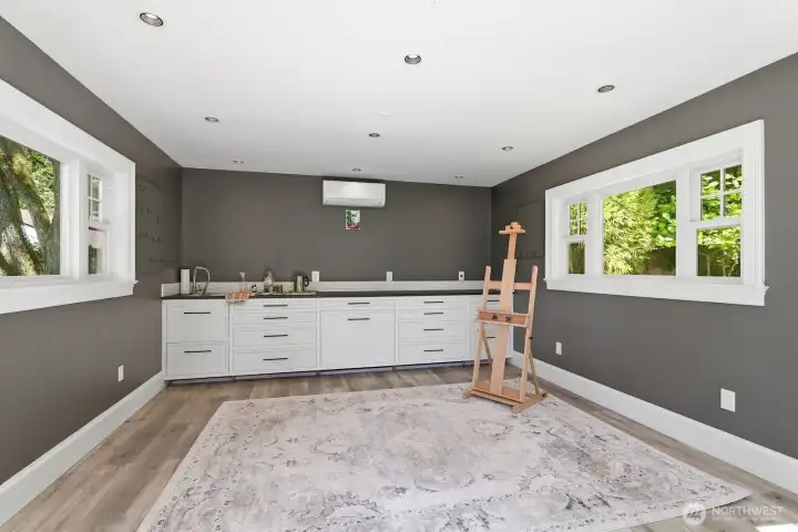 Use this amazing detached studio for projects, hobbies or a shop - heat & A/C from an efficient mini-split keep it comfy year-round.