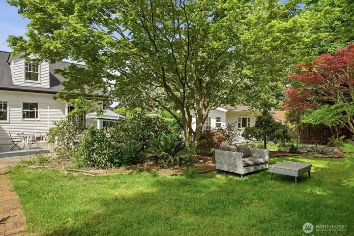 The yard is divided up into 'garden rooms', each with their own special details and perfect uses.