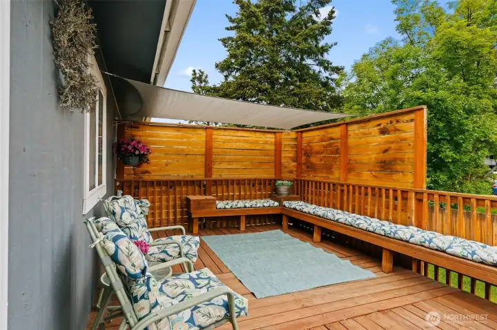 Wind protected deck off of kitchen.