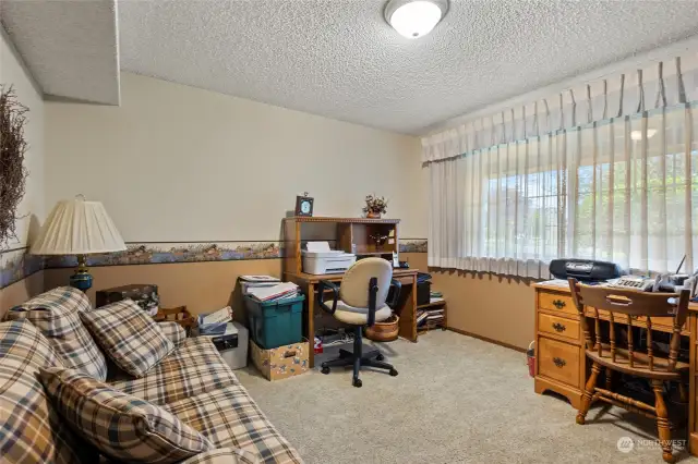 Main floor bedroom is currently used as an office.
