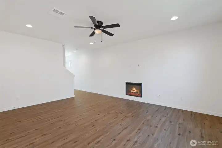 spacious great room, ceiling fan, LVP flooring