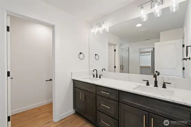 double sinks, walk-in closet, shower