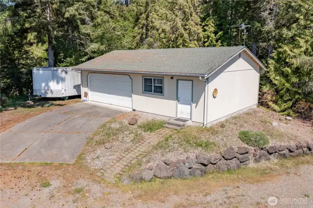 2 car garage with heated office/studio/gym