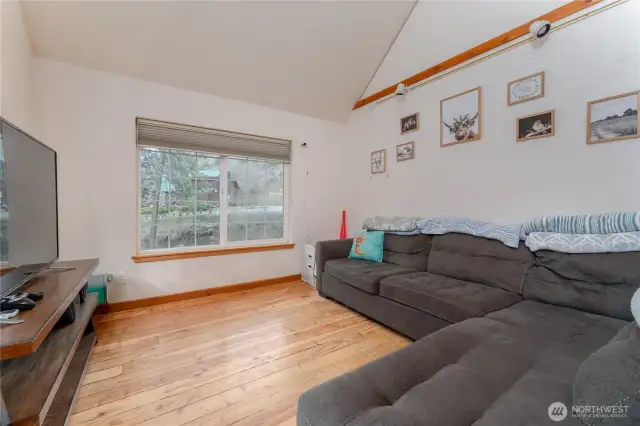 Living room with vaulted ceilings