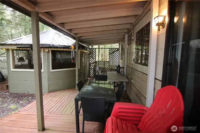 Covered outside living at the entry to the park model
