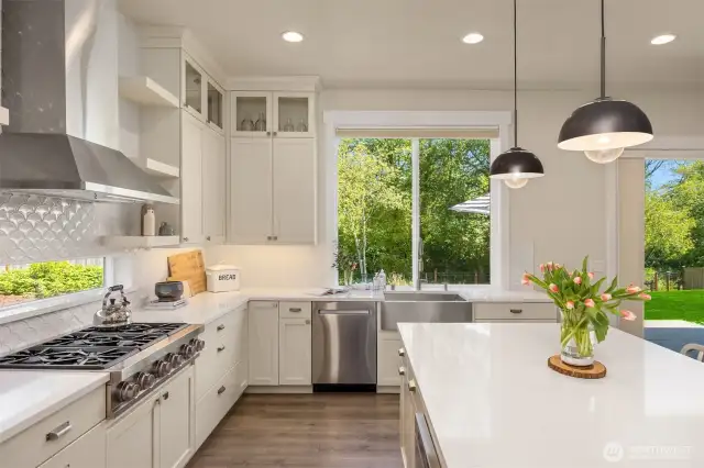 Ample storage is in this pretty kitchen including a spacious walk-in pantry.