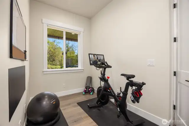 On the living level is an alcove that could be a terrific home office space or workout area.