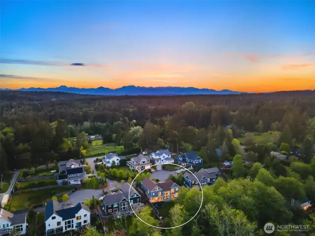This newer-construction 4-bedroom home sits on a large .36 acre lot and backs to green open space for extra privacy.
