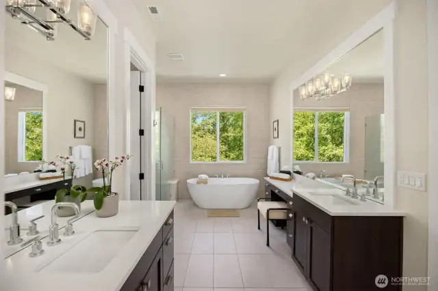 The five-piece spa-like primary bathroom.