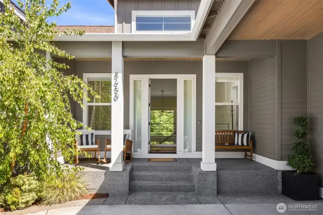 A gracious covered front porch and an easy paved driveway welcome you home and greet your guests.
