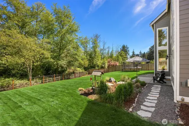 Easy access to the outdoors from the living level. The .36 acre lot is fully fenced in the backyard and backs to open space.