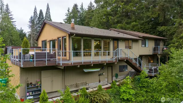 View of the back of the house, has a total of 3 deck areas