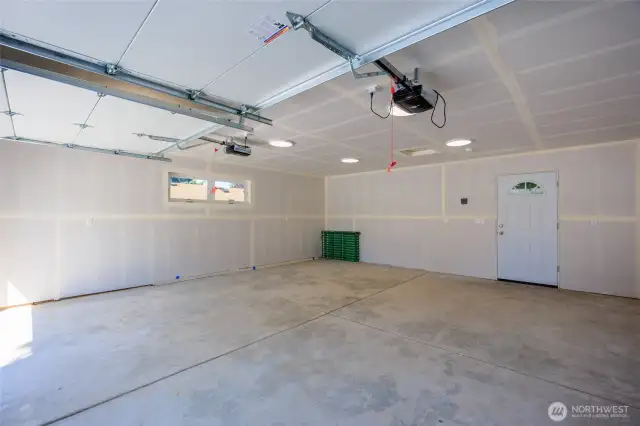 Imagine all the projects & hobbies in this expansive garage.