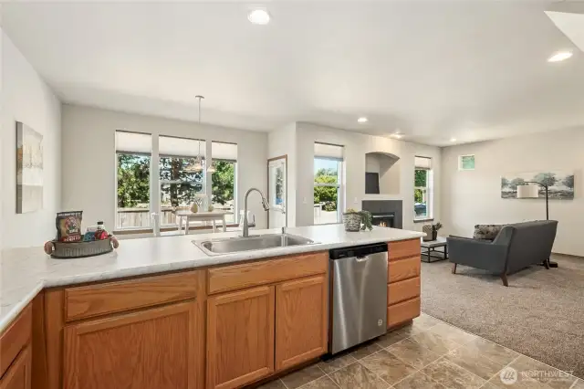 A great design allows the cook to enjoy easy interaction with occupants or guest. This kitchen in unit 129 has been just been updated with new countertops.