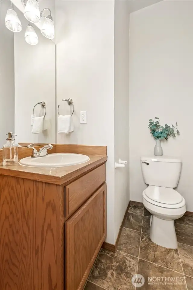 Classic main floor powder rooms with timeless style.