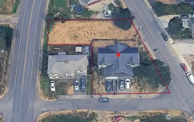 This updated duplex on a generous 1/3-acre lot offers exciting opportunities.