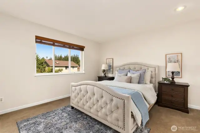 Primary suite sits at back of house, overlooking amazing backyard.
