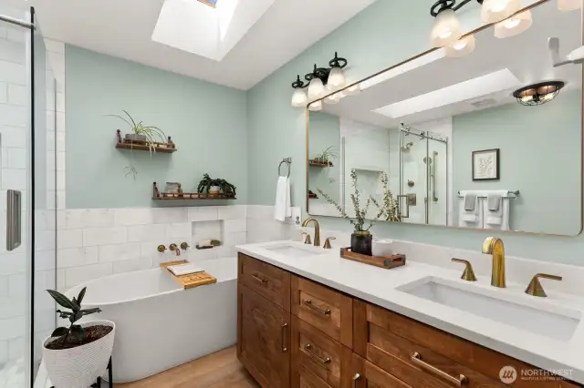 Custom cabinetry, dual sinks, large soaking tub, separate shower & skylight!