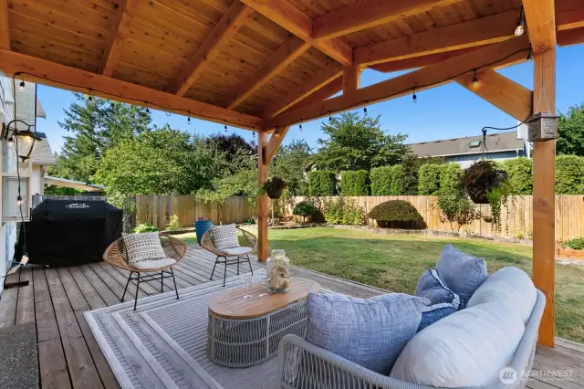 Amazing covered back deck allows for year-round enjoyment of this lovely space.