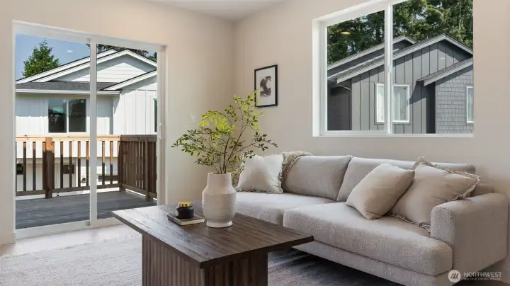 Great Room is bathed in light and offers deck to relax and enjoy the sunsets.