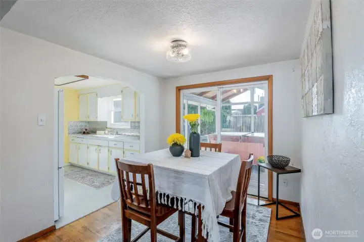 Original hardwood floors, we believe the hardwood is also under the carpet in the living room/hallway.